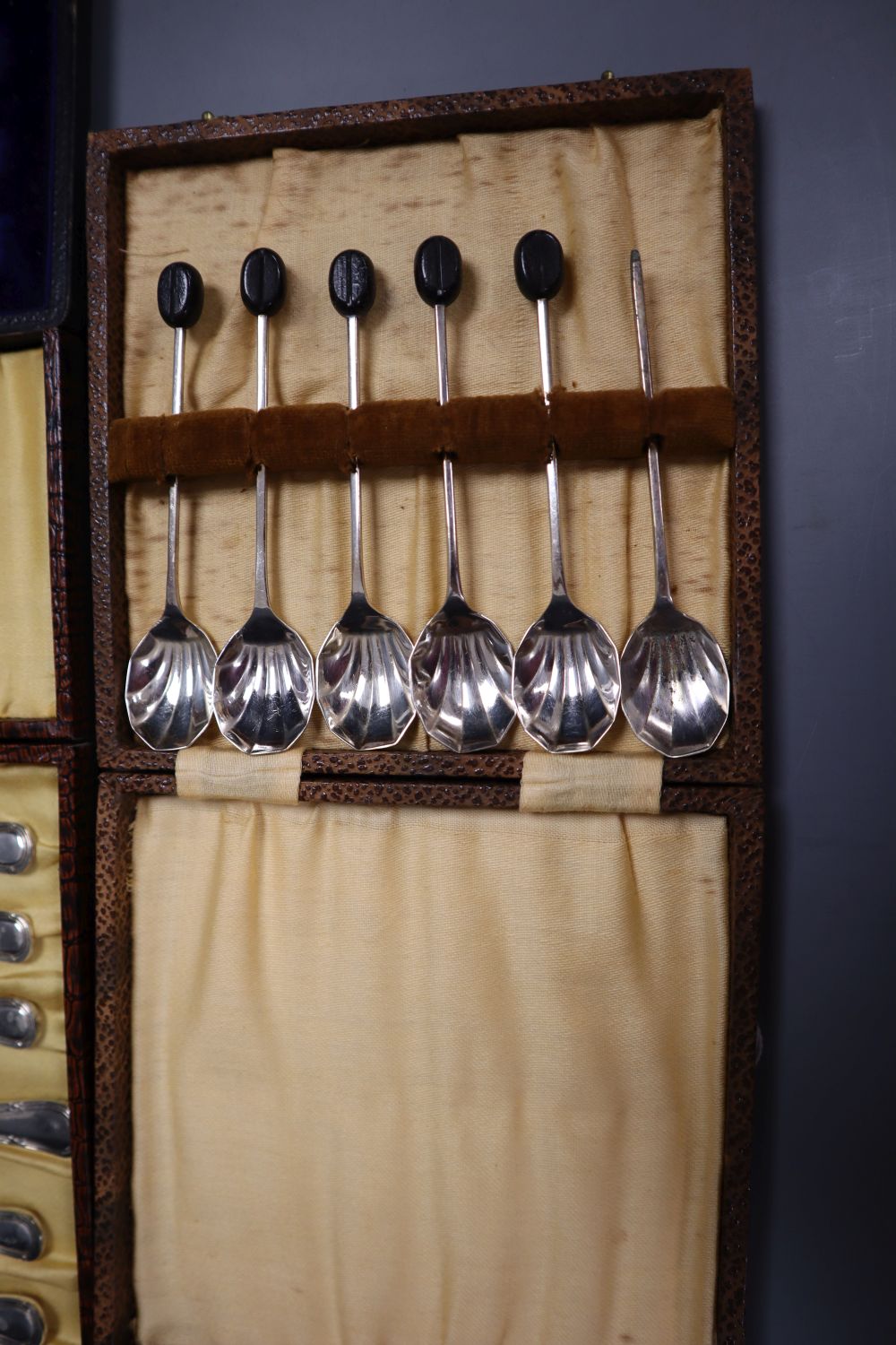 Five cases of plated cutlery.